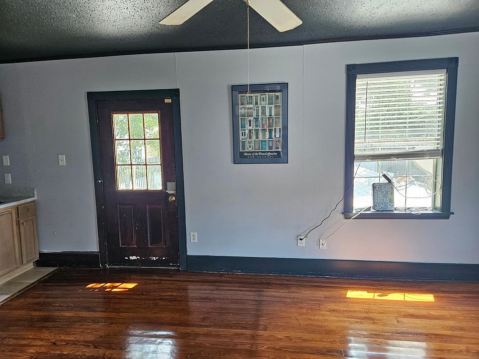 LIVING ROOM, DOOR LEADS TO BACK DECK
