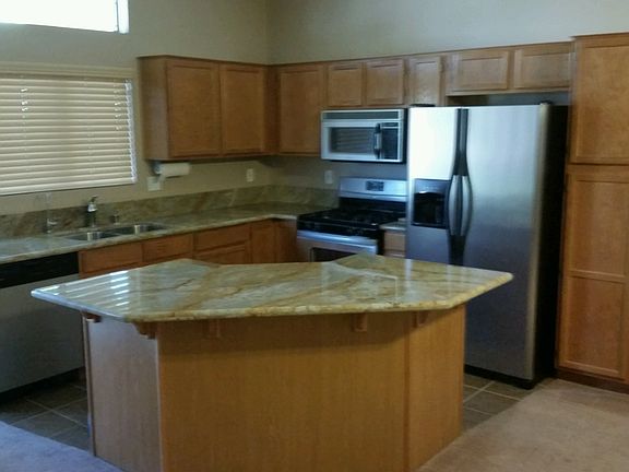 open kitchen w/ granite counters