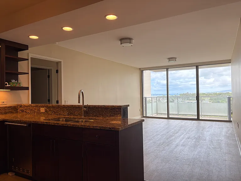 Kitchen and living room from entry.
