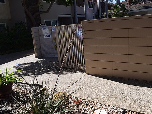 Pool gate (standing on the front porch)