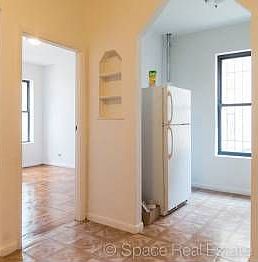 2nd image of 9516 Avenue A #4