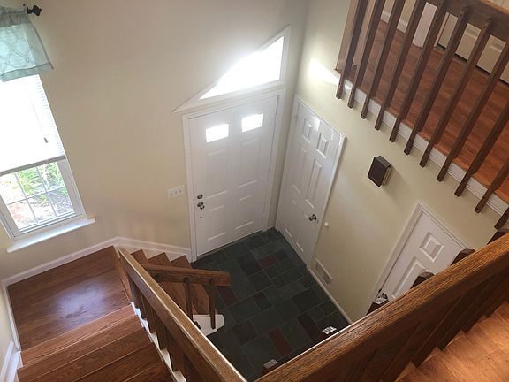 Entry Foyer Area w/ Half Bath & Coat Closet