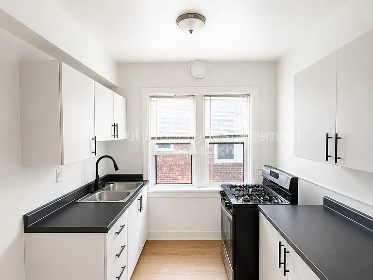 7340 Forsyth Blvd #307 — Photo 1