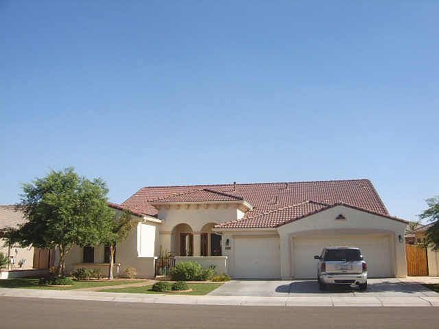 Gated Community! 4 bdrm + a den. Home faces N/S.  Also no 2-story neighbors! 