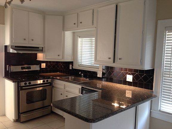 Eat-in kitchen with granite and stainless appliances