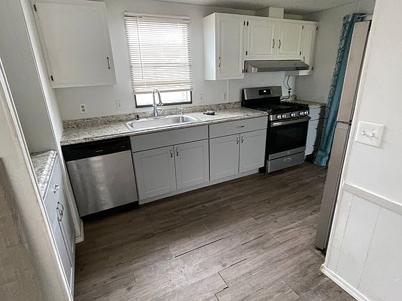 Kitchen includes updated countertops, a pantry, and all appliances are included