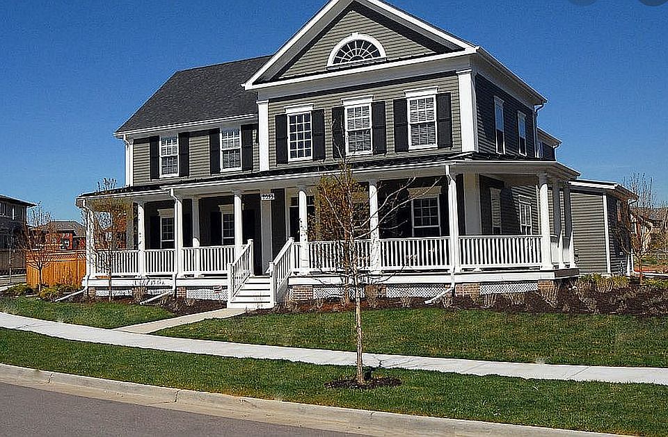 Wide 3-side wraparound porch