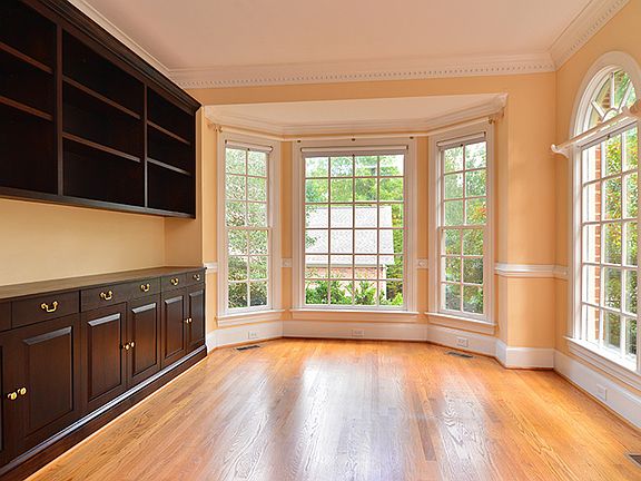 Home office with tons of natural light and storage space.
