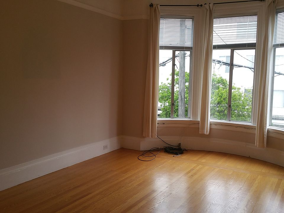 Living room with bay windows