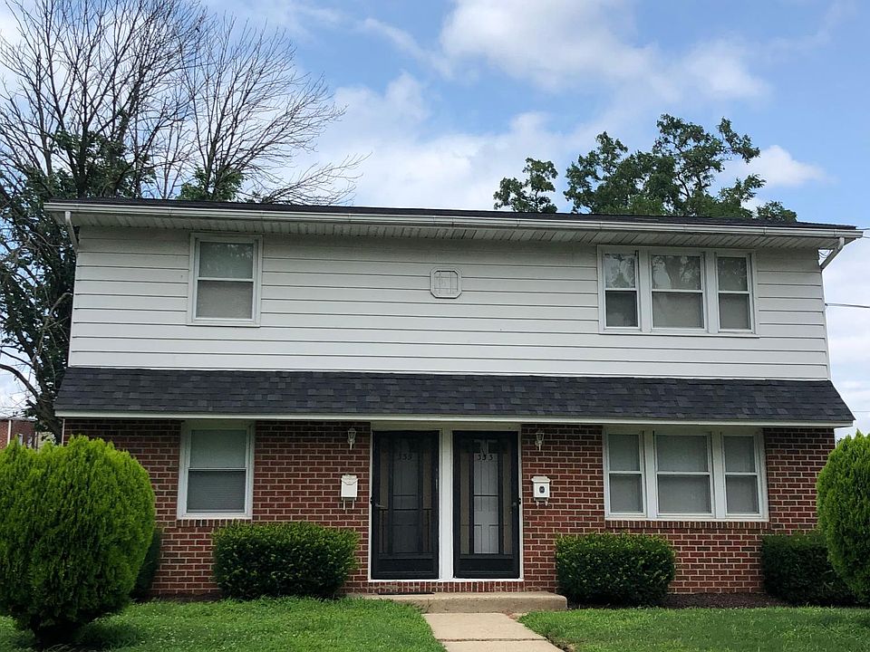 2nd Floor Apartment. Stairs leading from front door up to the apartment.