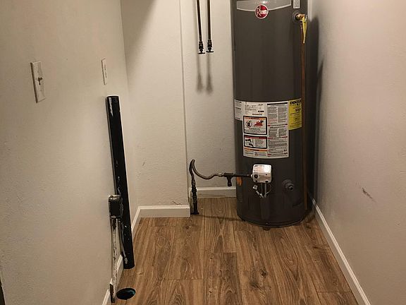 laundry room with full size washer and dryer capacity