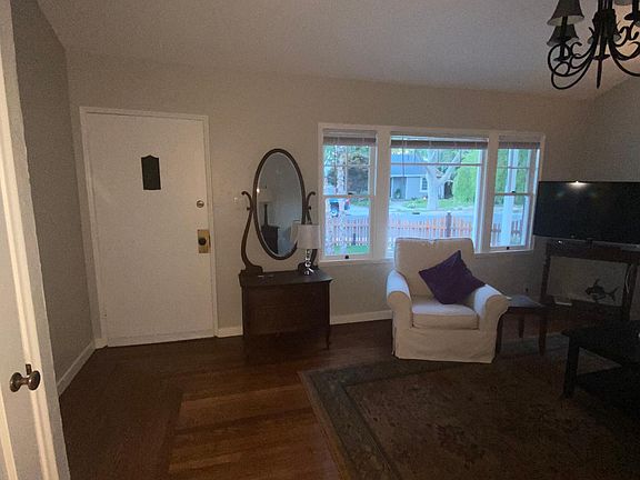 Front door from the inside. Living room to your right, dining room to the left, and walk-in front hall closet to immediate left.