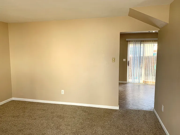 Living room looking into kitchen