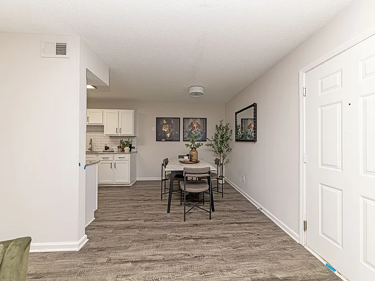 Dining area with hardwood-style flooring