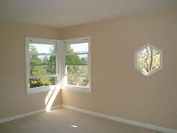 spacious bedroom with built in drawers