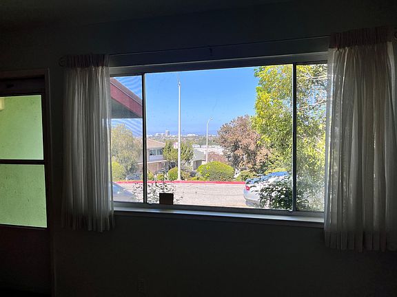 A closer photo of the view from the large window in the living room.