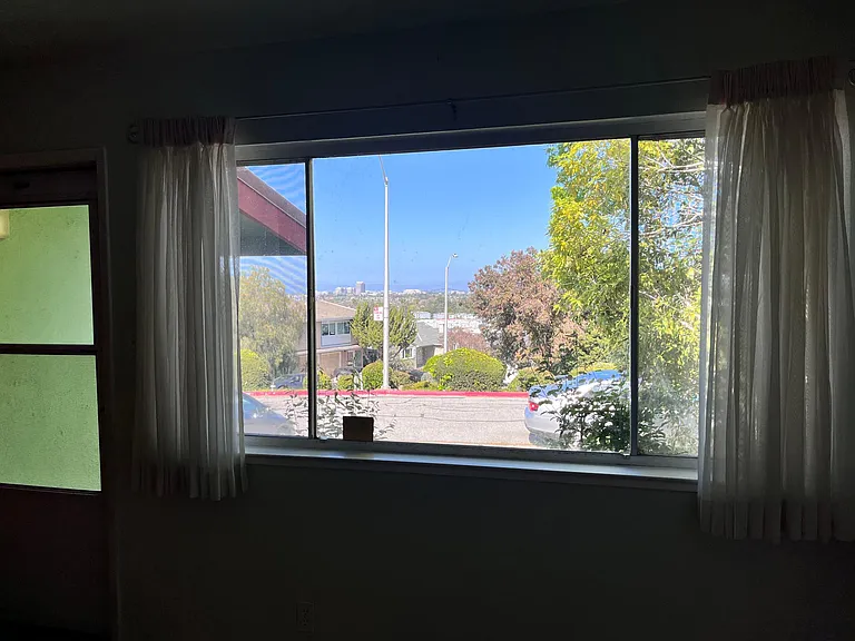 A closer photo of the view from the large window in the living room.