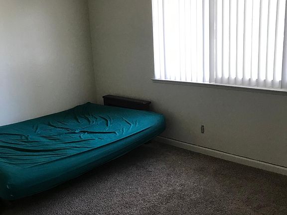 one of three bedrooms