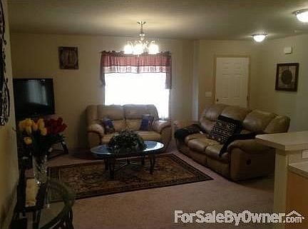 LIVING ROOM
						:
						open living room with plenty of light