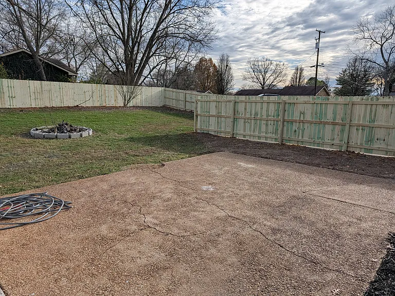 Huge private back yard with patio and fire pit