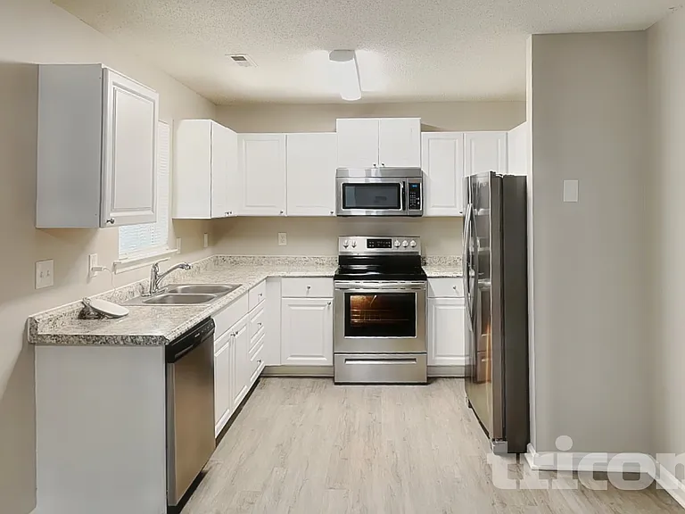 7112 Windsong Way — Photo 4
