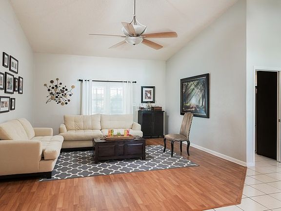 Living Room. French Doors open to the Pool Patio