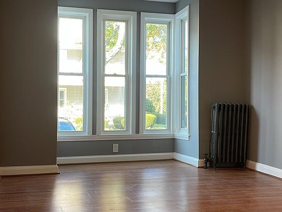 Bay window perfect for a little reading nook.
