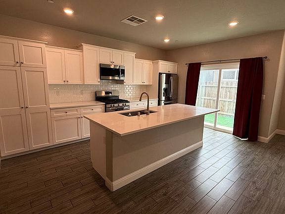 5th image of 6169 E Garland Ave