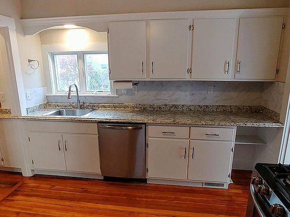 Plenty of workspace and storage in this kitchen. Pantry to the left, Foyer to the right