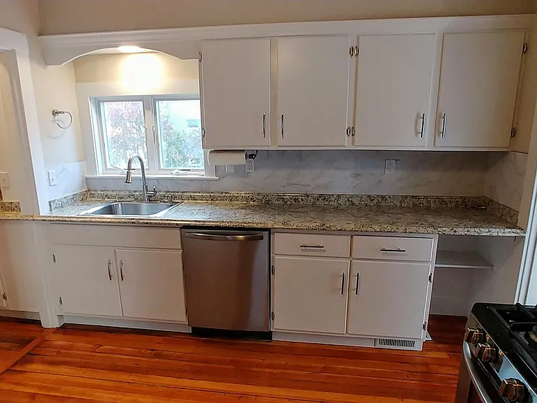 Plenty of workspace and storage in this kitchen. Pantry to the left, Foyer to the right
