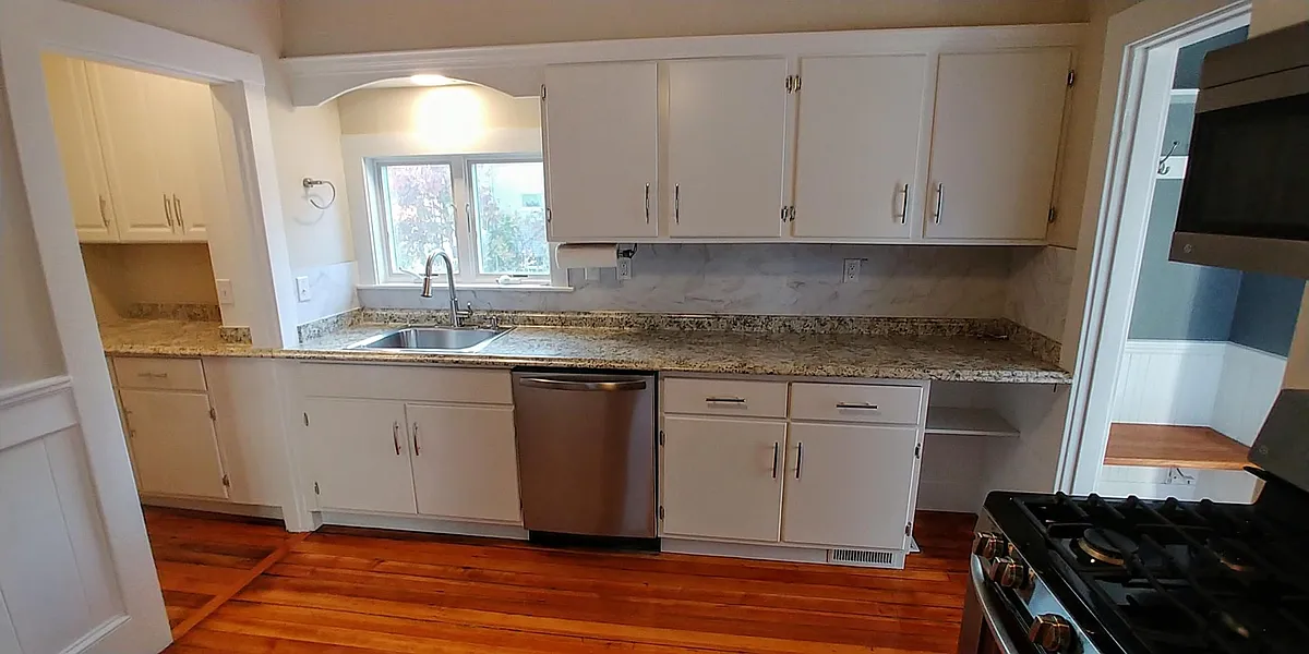 Plenty of workspace and storage in this kitchen. Pantry to the left, Foyer to the right - 32 Peirce St