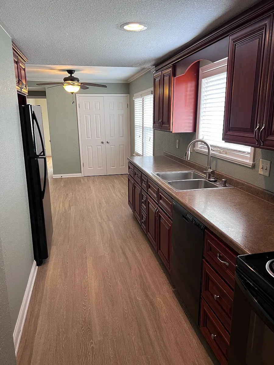 Kitchen view towards dining area - 9011 W Adler St