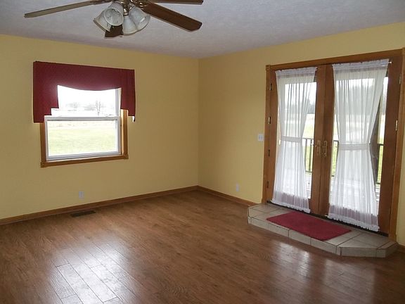 french doors lead to large deck