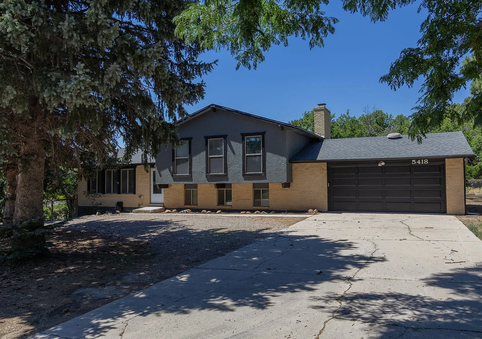 Large home on almost an acre- Academy and Flintridge, 80918! — Photo 1