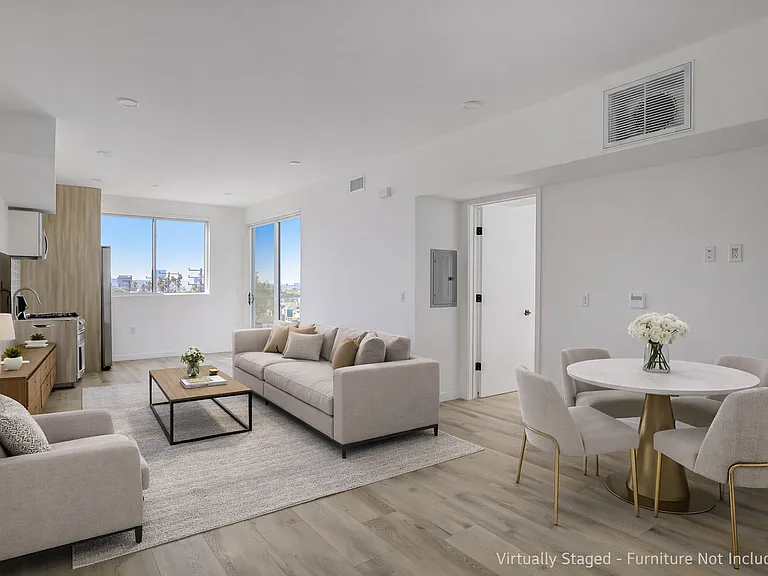 Certain photos may include virtual staging for illustrative purposes only. Furniture and decor shown are not included in the lease. No structural changes, alterations to layout, finishes, fixtures, or views have been made to the unit.