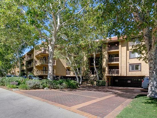 First floor unit in resort like building on quiet street