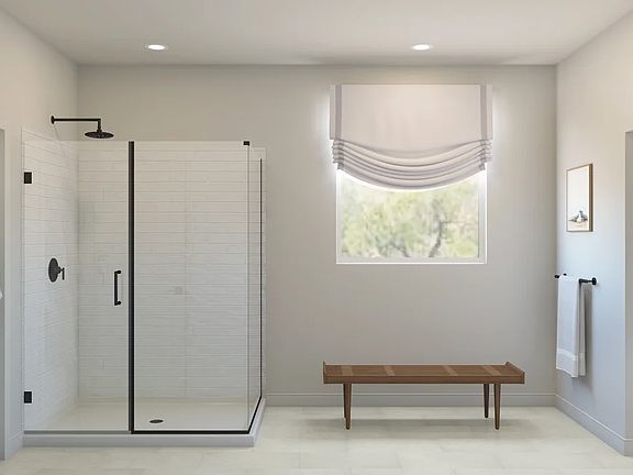Primary bath with glass shower enclosure