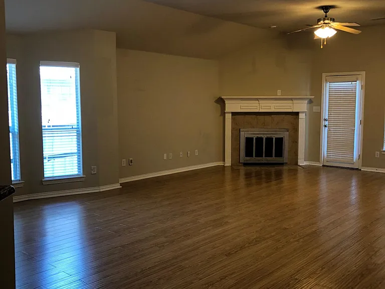 spacious family living area with breakfast nook to the left