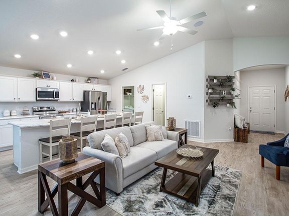 Spacious and welcoming gathering room - New home for sale in Ocala, FL. - Photo showcases a model ho