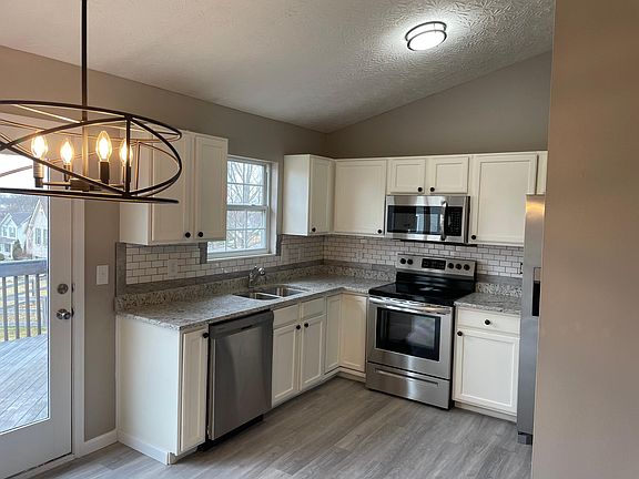 Kitchen is basically brand new! Stainless steel appliances still have tags on them! Brand new granite counter tops. Luxury vinyl tile. Very light and bright!