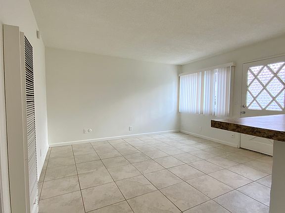 Living Area; Photos of a similar unit. Available unit has luxury vinyl "wood" plank flooring throughout except in the bedroom (high grade Berber carpet).