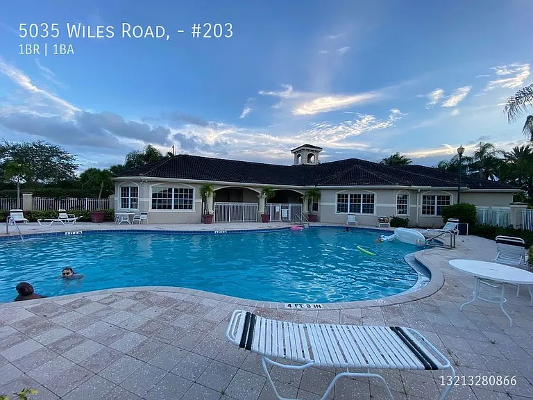 5035 Wiles Rd #203 — Photo 39