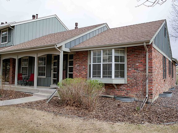 Front of house. This is the last unit on the row of townhomes with an open greenbelt on the side of the house.