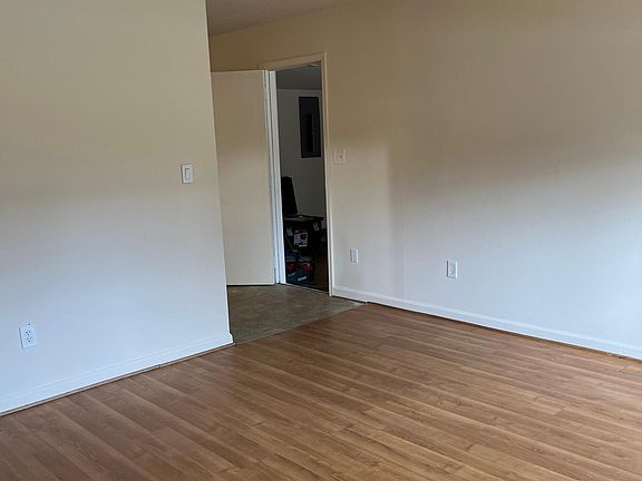 Living room looking toward kitchen area