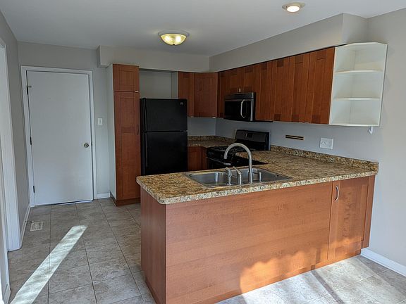 Great kitchen with loads of work surfaces and storage