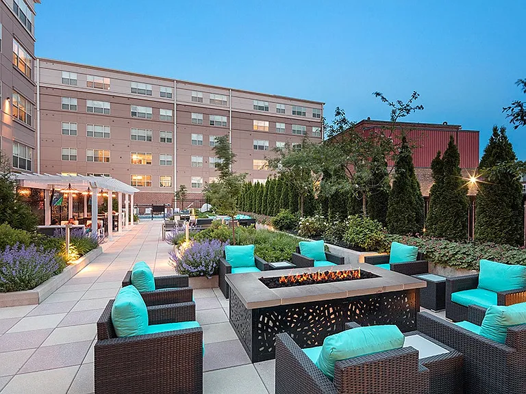 Enjoy the outdoor courtyard with games, fire feature and seating