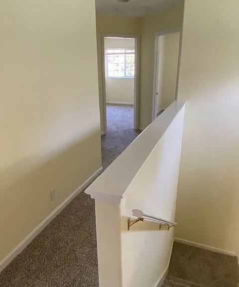 Hallway to 2nd and 3rd bedrooms