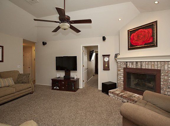 Living room has fireplace