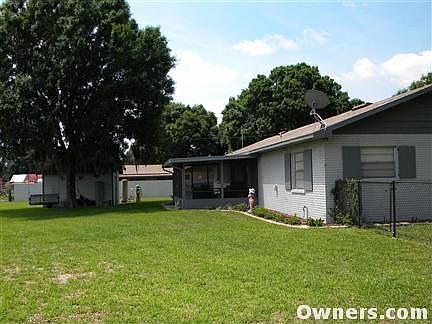BACK OF HOUSE, SCREEN PORCH, SMALL SHED