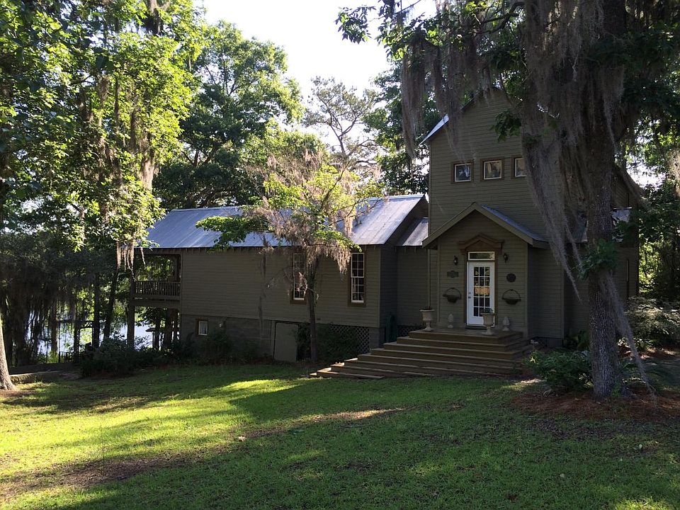 Basement apartment on left side with carport with a gorgeous